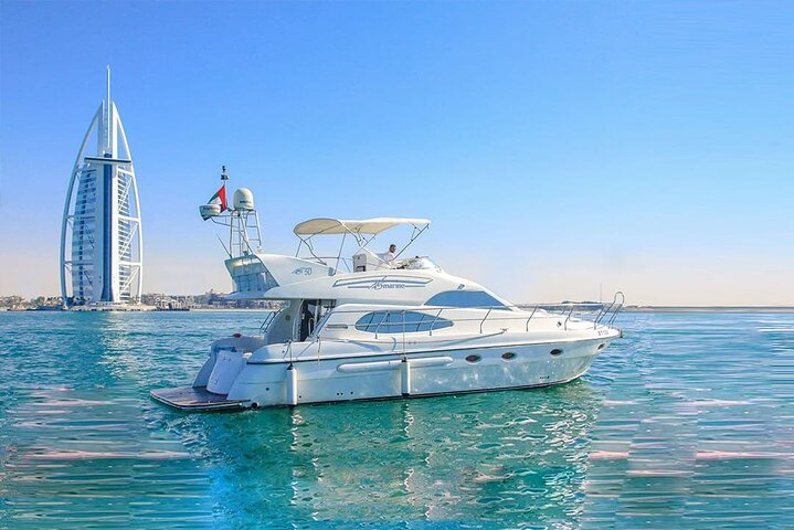 Experience the breathtaking Dubai skyline while relaxing aboard a luxurious yacht where the calm waters invite you to capture unforgettable moments against a stunning backdrop.